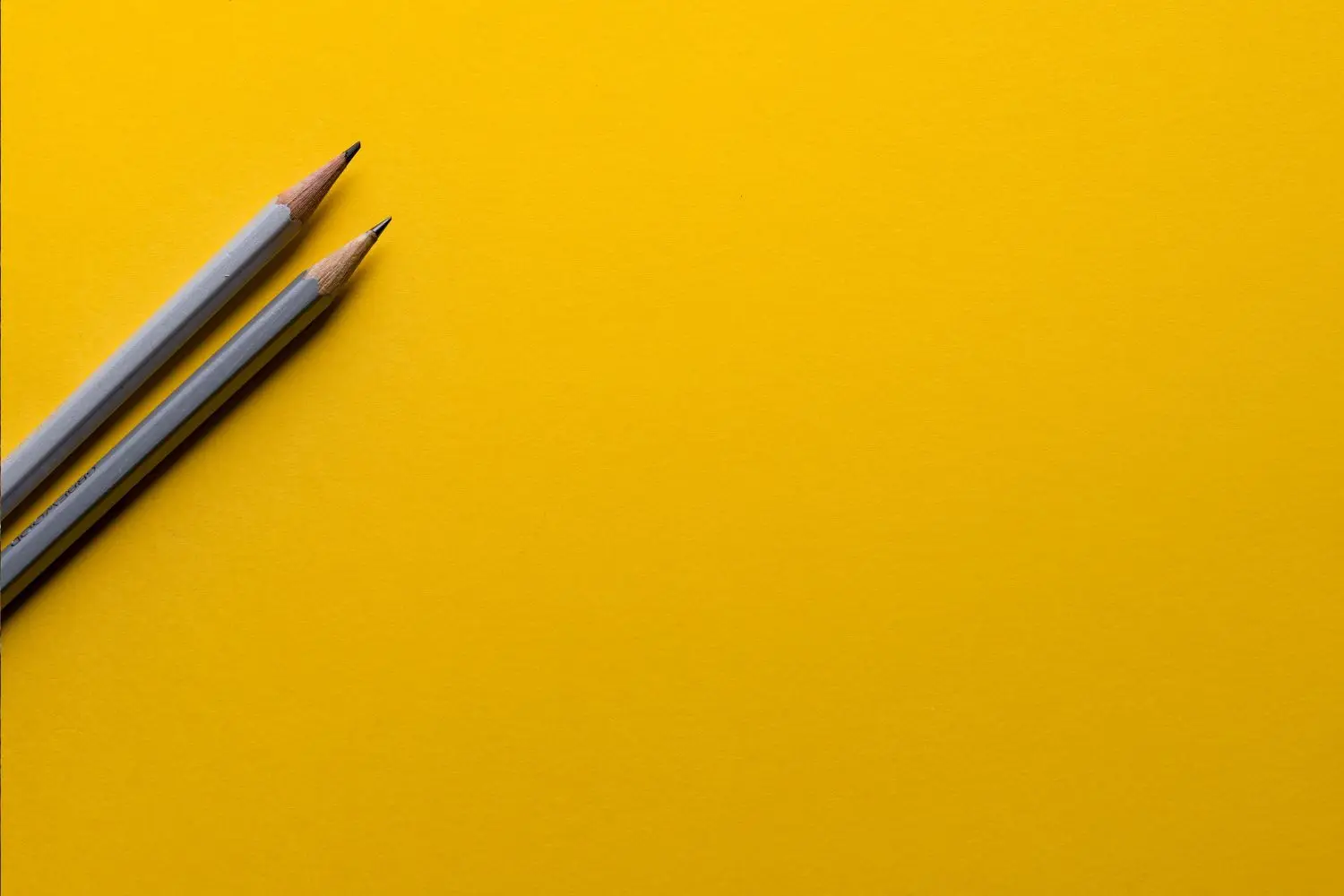 Marketing case studies - image of two pencils.