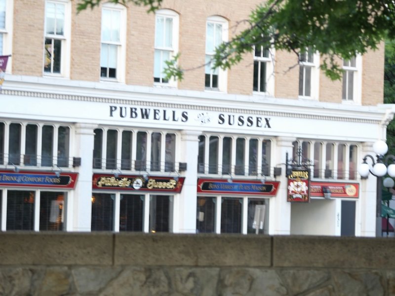 Victorian pub frontage with Sussex on its sign
