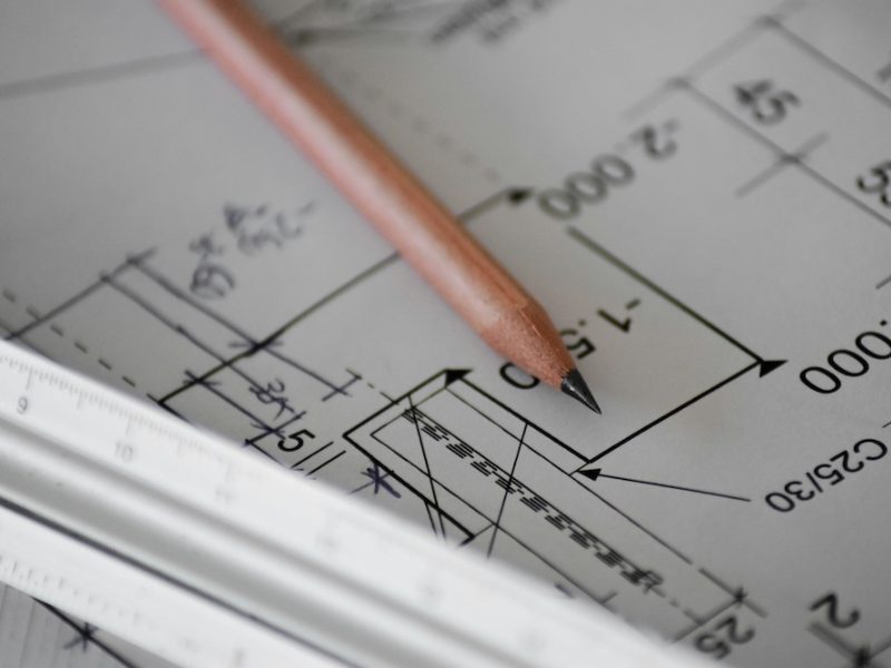 Pencil and ruler on a technical drawing